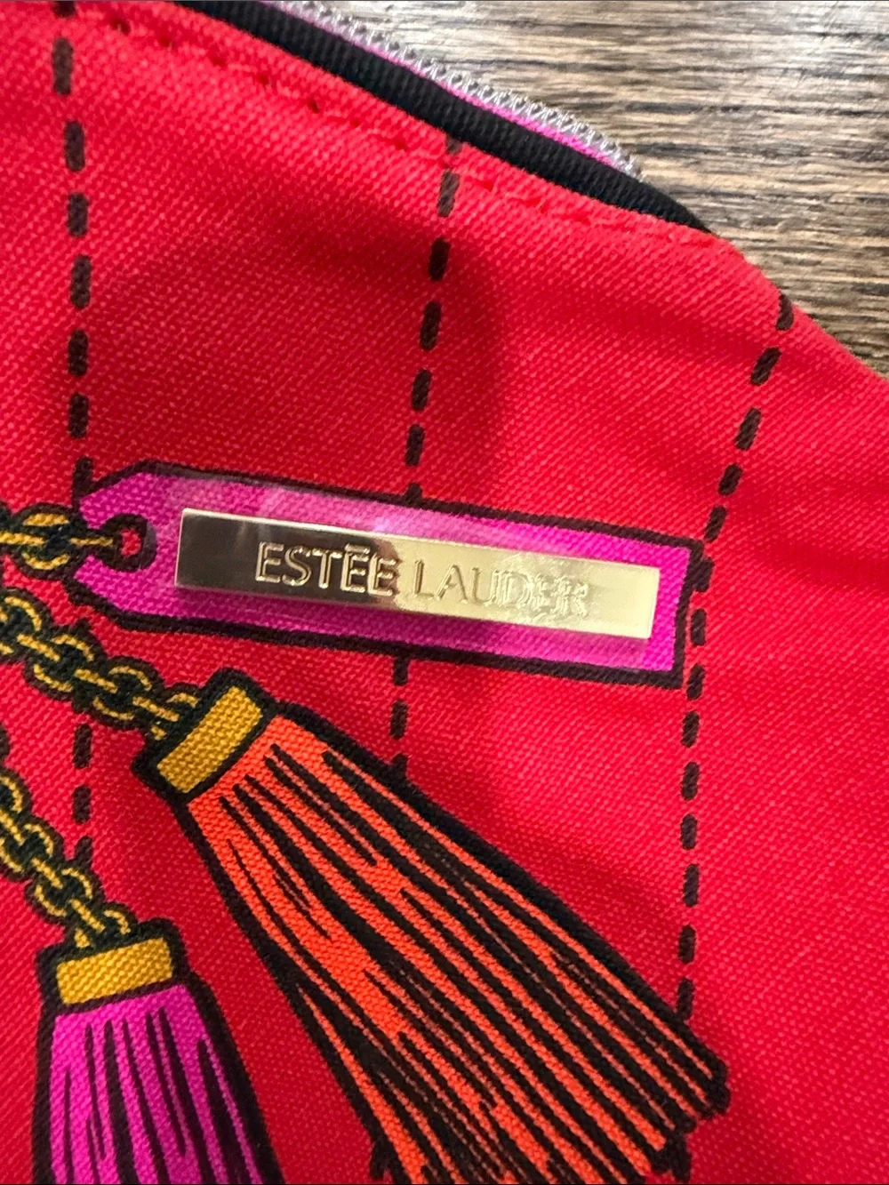 Estée Lauder Red Tassel Cosmetic Pouch and 3 rose eye masks